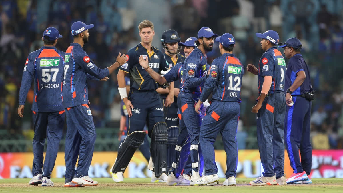 Lucknow Super Giants' players congratulate each others after defeating Gujarat Titans in the Indian Premier League cricket match in Lucknow, India, Sunday, April 7, 2024.