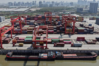 An aerial view of Xiasha Container Terminal on a canal in Hangzhou in east China's Zhejiang province Sunday, April 06, 2025.
