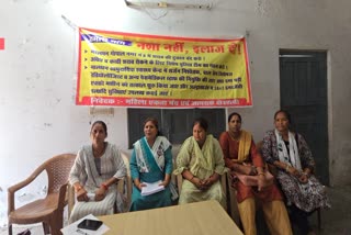 PROTEST AGAINST LIQUOR SHOP