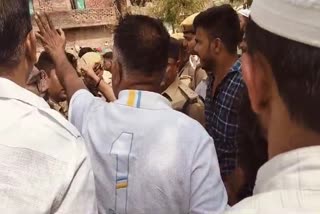 Police pacifying locals after Islamic cleric hacked to death in UP's Pratapgarh on Saturday, June 8, 2024
