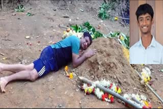 மகனின் கல்லறையில் படுத்து கதறி அழும் தந்தை