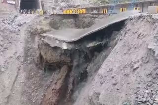 Road connecting two tunnels washed away in landslide