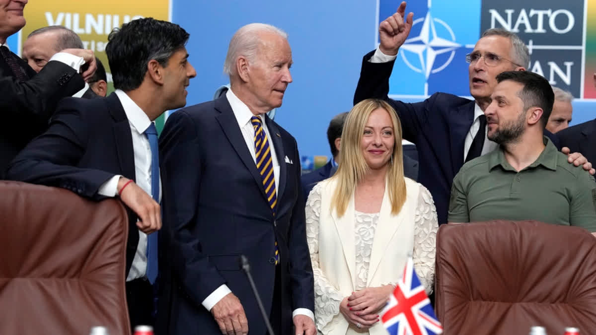 From left, Lithuania's President Gitanas Nauseda, British PM Rishi Sunak (Now Former), President Joe Biden, Italy's Prime Minister Giorgia Meloni, NATO Secretary General Jens Stoltenberg and Ukraine's President Volodymyr Zelenskyy pose during a meeting of the NATO-Ukraine Council during a NATO summit in Vilnius, Lithuania, July 12, 2023.