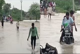 PEOPLE CROSS BRIDGE RISKING LIVES