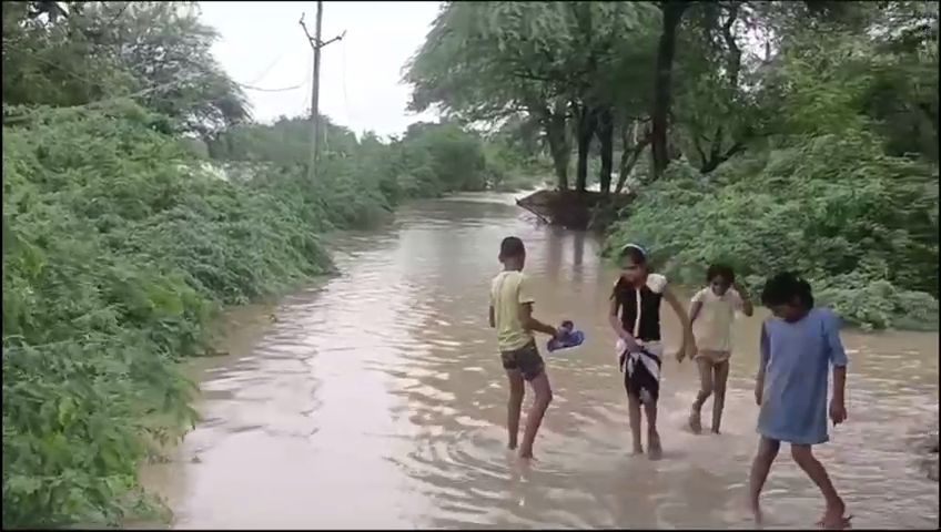 People crossing bridge