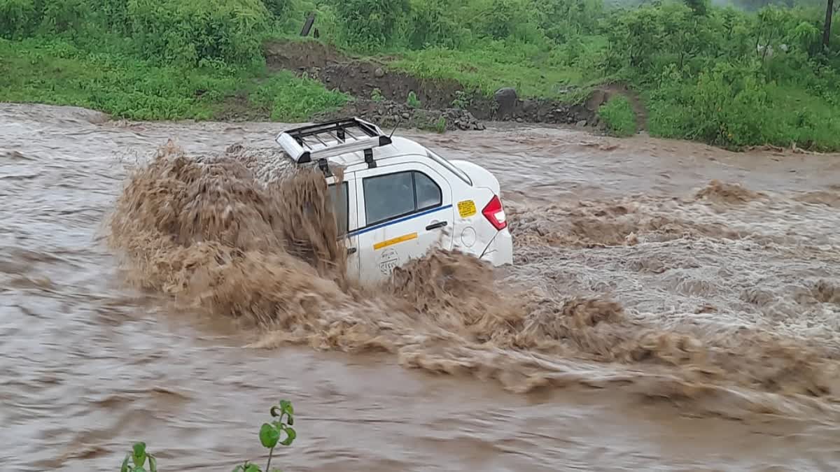 Two Car Washed Away in Drain