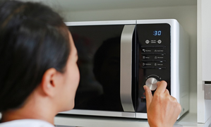 Highly adapted microbes found in microwave ovens