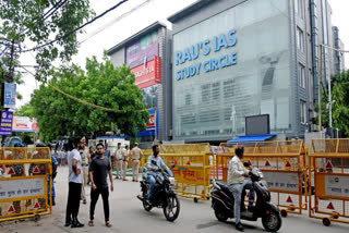 The magisterial report on the flooding death of three civil service aspirants in Delhi highlights violation of laws, including unauthorised use of the building's basement and failure to act on prior notices about misuse. The report also accuses officials of deliberate misconduct and mishandling of the situation.