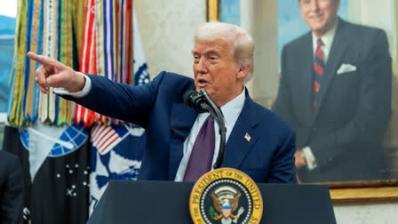 President Donald Trump speaks while making an announcement about Apple with Apple CEO Tim Cook in the Oval Office on Wednesday