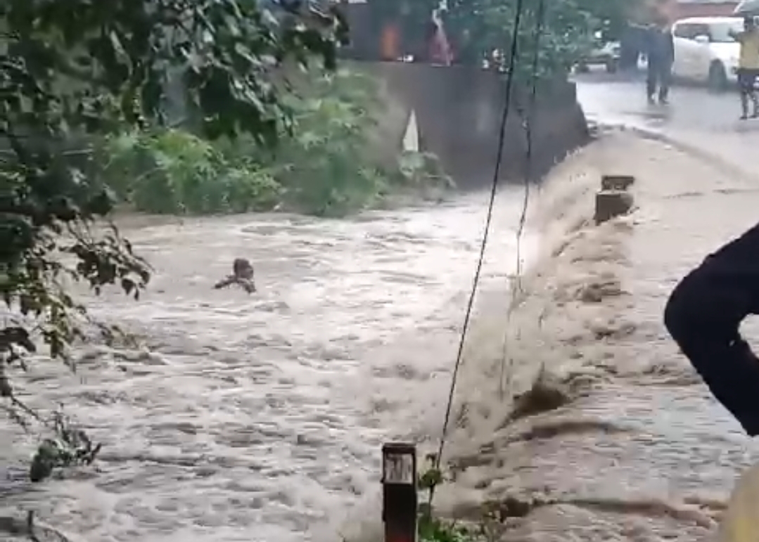 Man washed away with bike