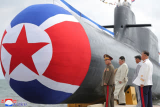 North Korea says it has launched a new nuclear attack submarine to counter US naval power