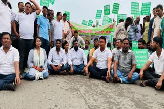 public stages protest over road issue