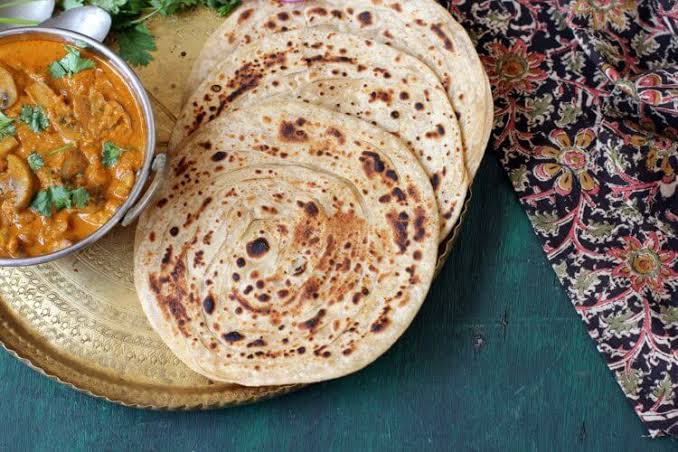 Rajasthani dishes Ajwain parantha and Gatte ki sabji