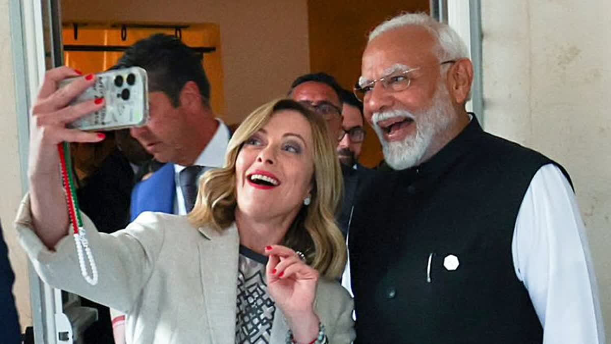 Prime Minister Narendra Modi poses for a selfie with Italian PM Giorgia Meloni on the sidelines of the G7 Outreach Summit, in Apulia in June 2024.