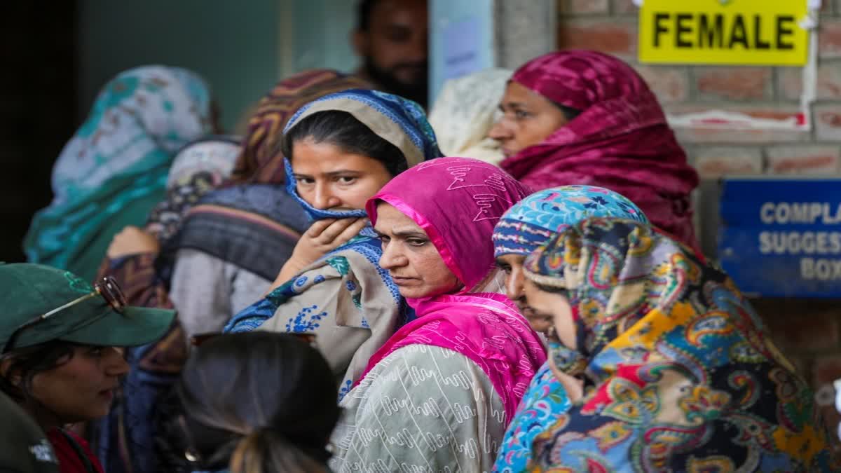 Women waiting in queue for casting their vote in J&K