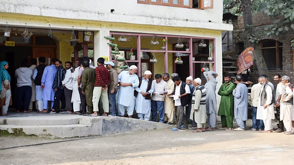 Male voters waiting queue to caste their vote in J&K