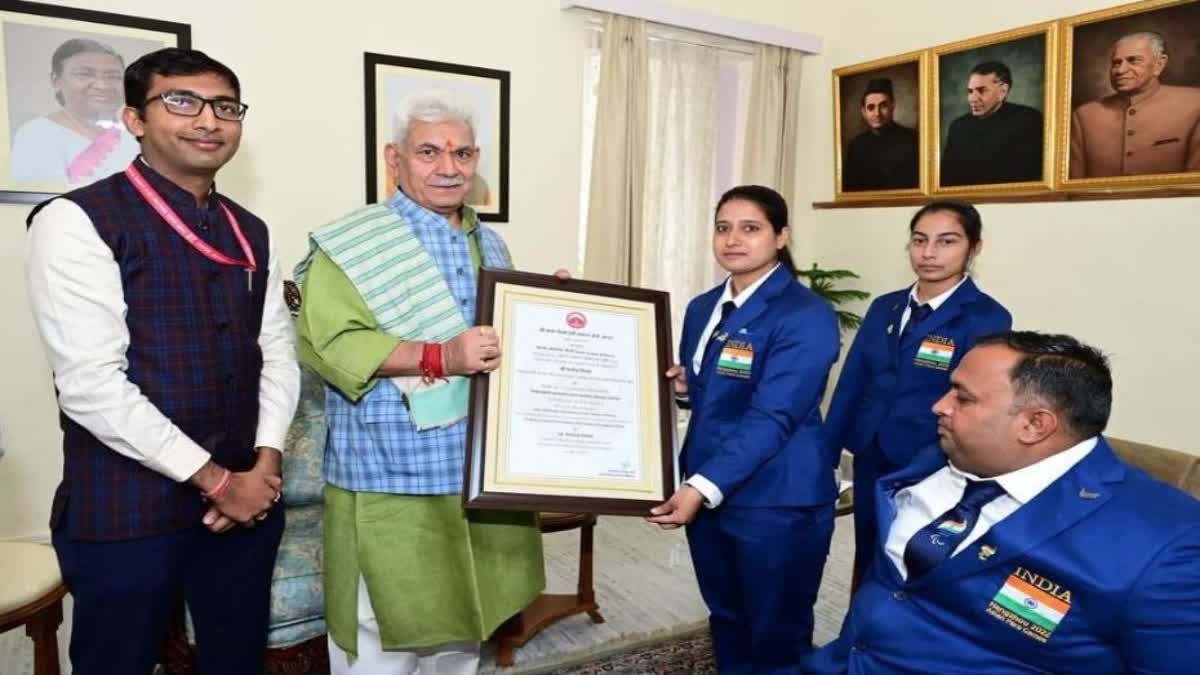 LG Manoj Sinha talks to para archer Sheetal Devi and Rakesh Kumar