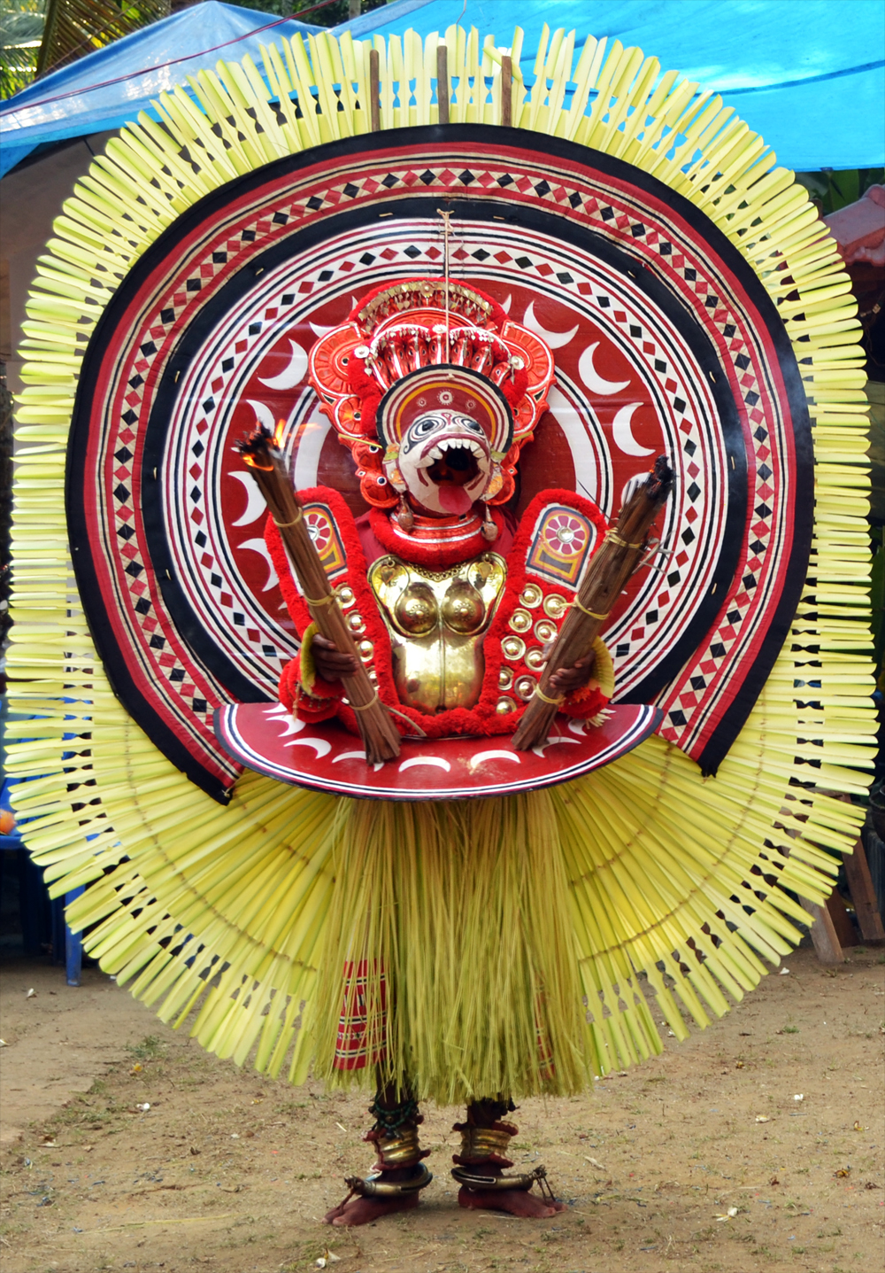 KERALA THEYYAM ART FORM  THEYYAM ART FORM HISTORY  BELIEFS BEHIND THEYYAM  MAKEUP DRESS OF THEYYAM