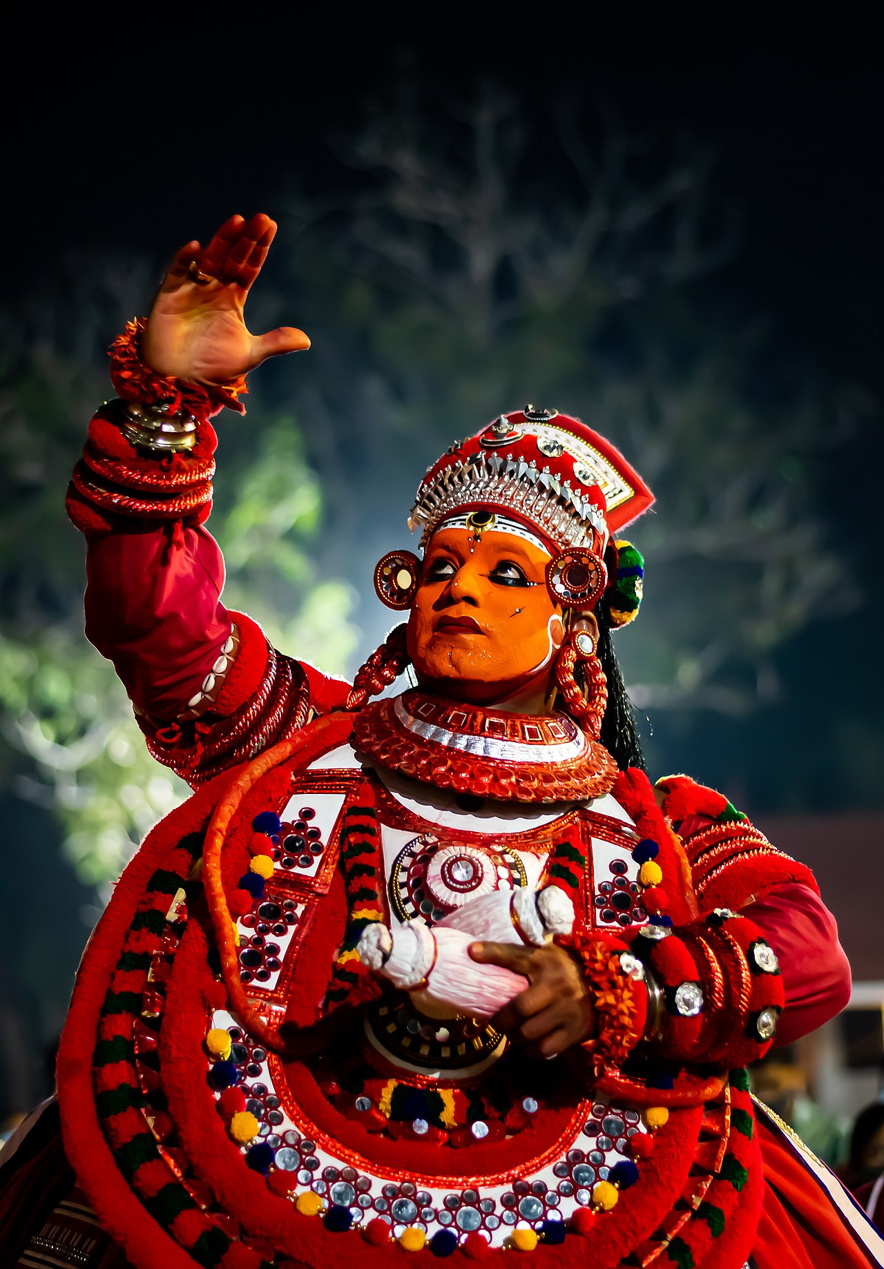 KERALA THEYYAM ART FORM  THEYYAM ART FORM HISTORY  BELIEFS BEHIND THEYYAM  MAKEUP DRESS OF THEYYAM