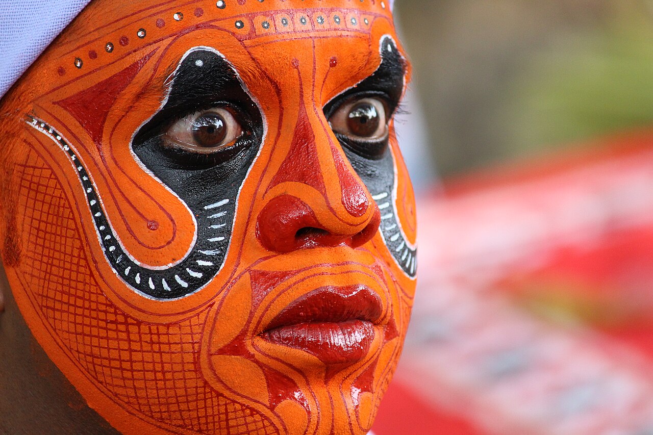 KERALA THEYYAM ART FORM  THEYYAM ART FORM HISTORY  BELIEFS BEHIND THEYYAM  MAKEUP DRESS OF THEYYAM