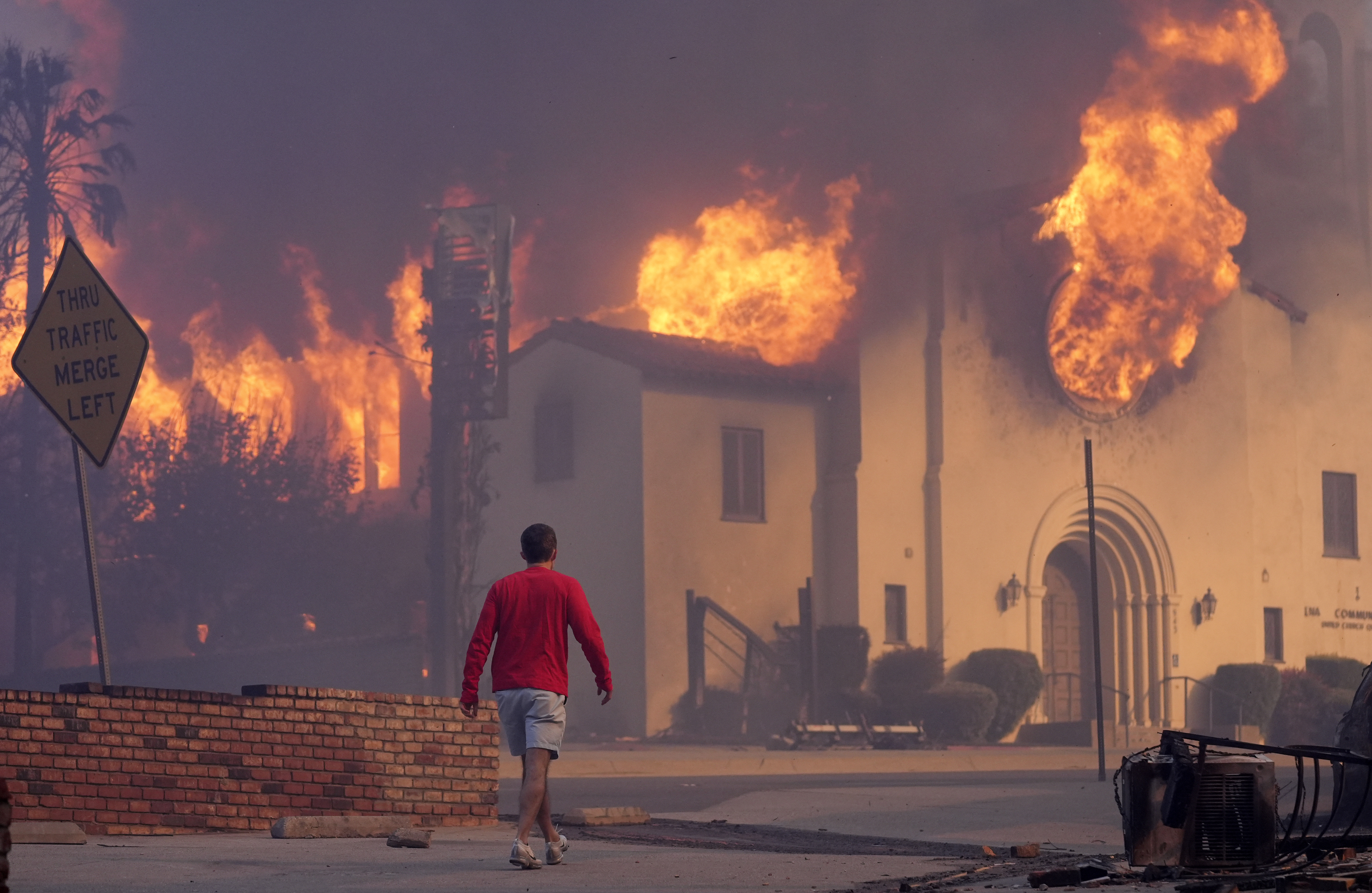 Los Angeles Wildfires  burning homes through flames  Flames broke out  Pacific Palisades wildfire