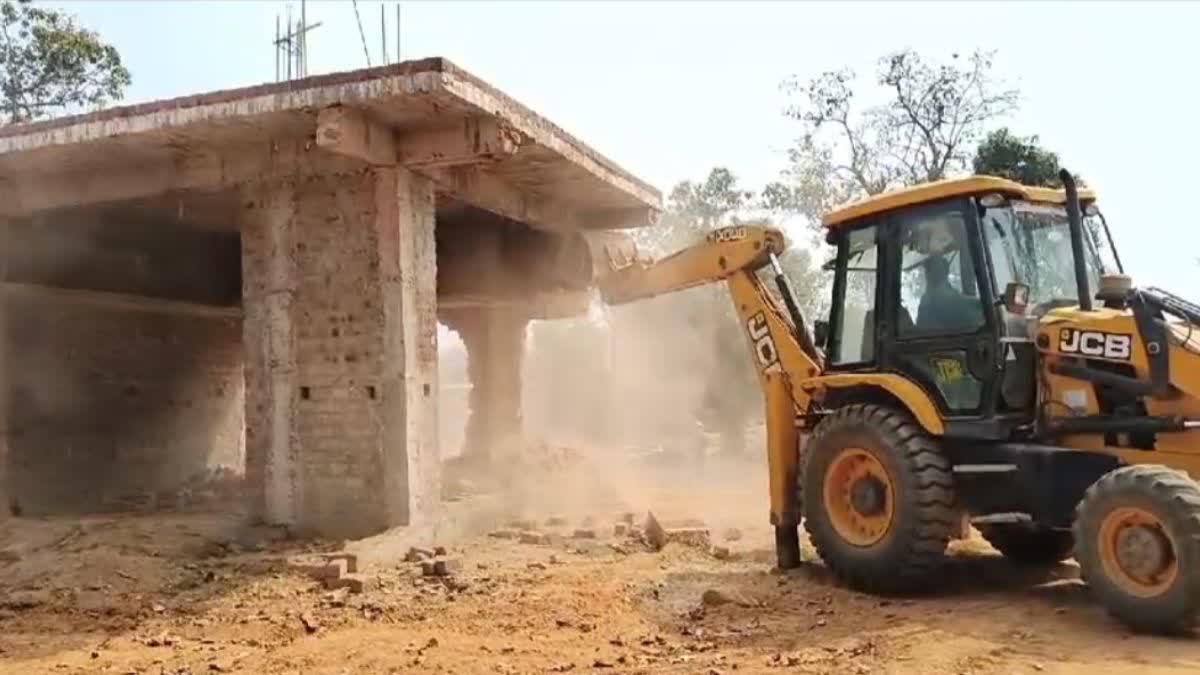 Bulldozer on illegal occupation