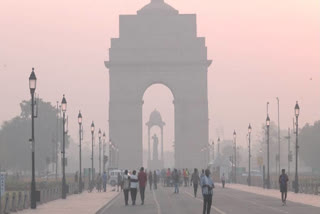 A view of India Gate covered in a thin layer of smog in New Delhi.