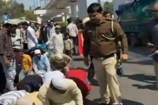 Police Officer Hitting Few Men