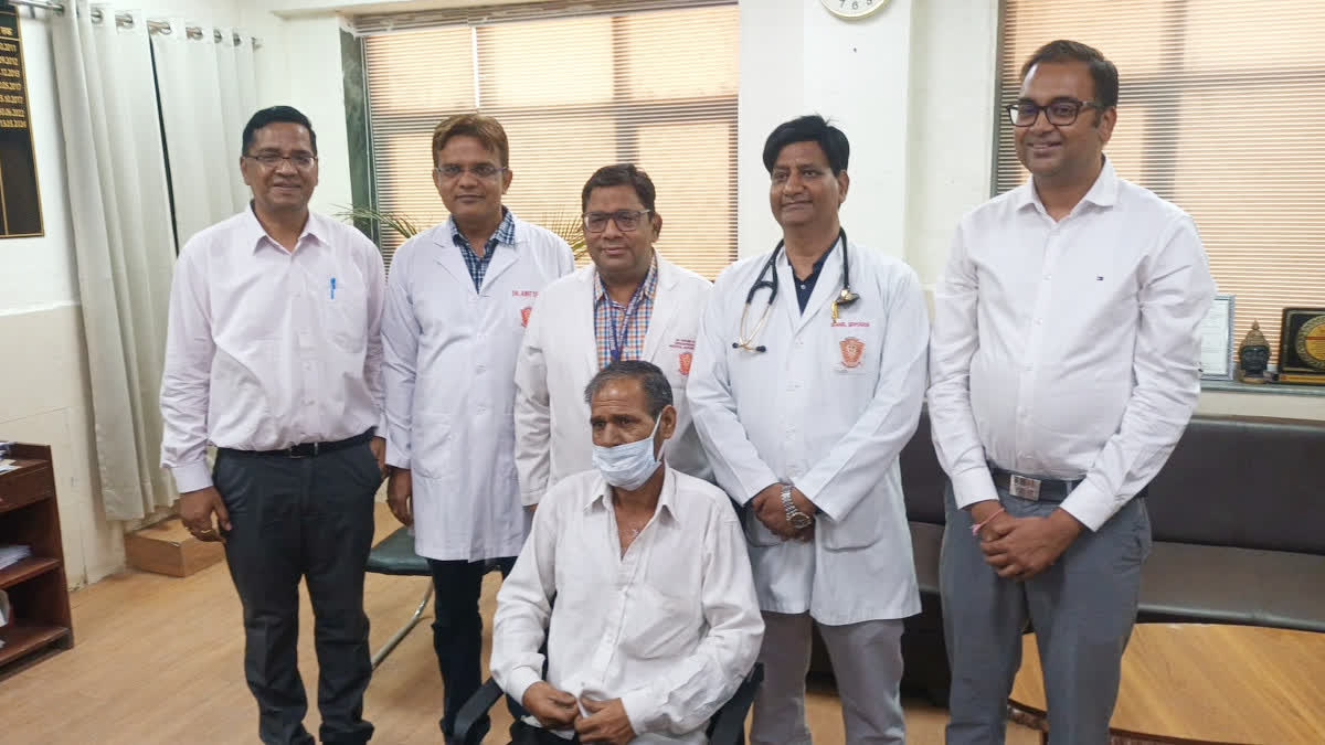 Doctors with patient