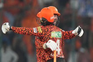 Sunrisers Hyderabad's Travis Head and Abhishek Sharma celebrates after winning the Indian Premier League cricket match between Sunrisers Hyderabad and Lucknow Super Giants in Hyderabad, India, Wednesday, May 8, 2024.