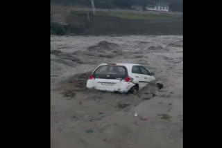 A video showing a car being washed away in the River Beas River near Kullu on Sunday went viral on social media. In the video, a parked car can be seen starting to sink into the river and then being swept away due to the heavy flow of the river.