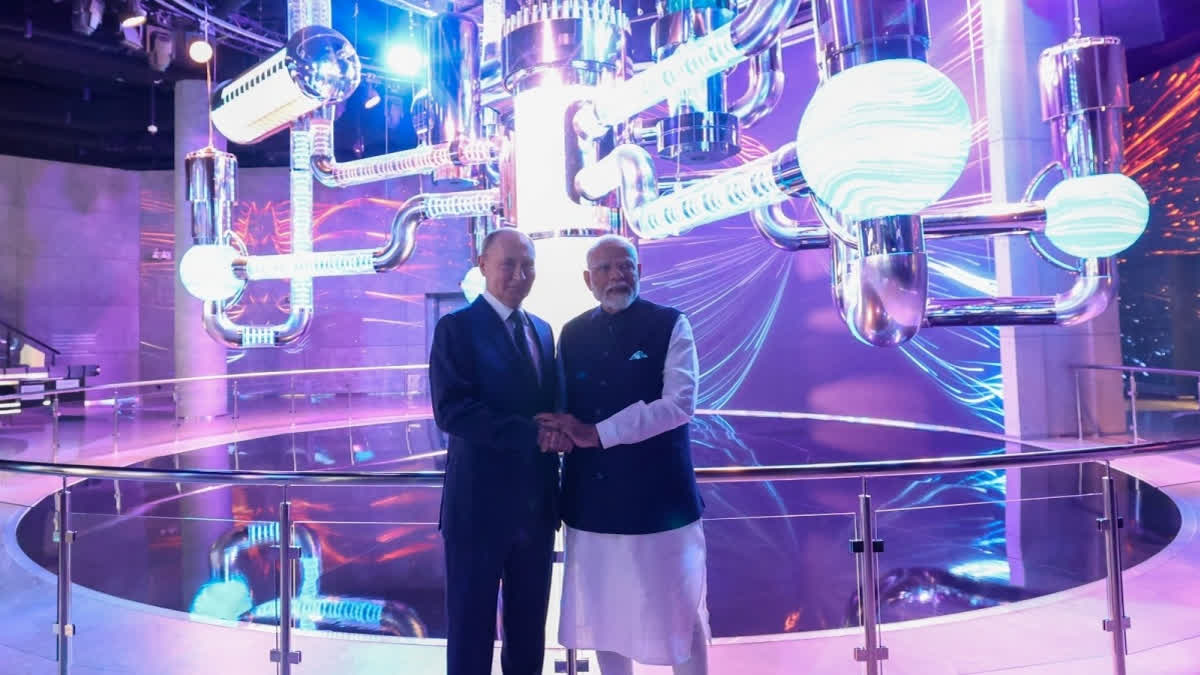 PM Modi at Atom Pavilion with President Putin.