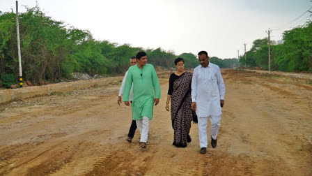 Delhi Minister Saurabh Bharadwaj, left, with minister Atishi and a local of the area in Delhi where 1,100 Trees have been 'felled'.