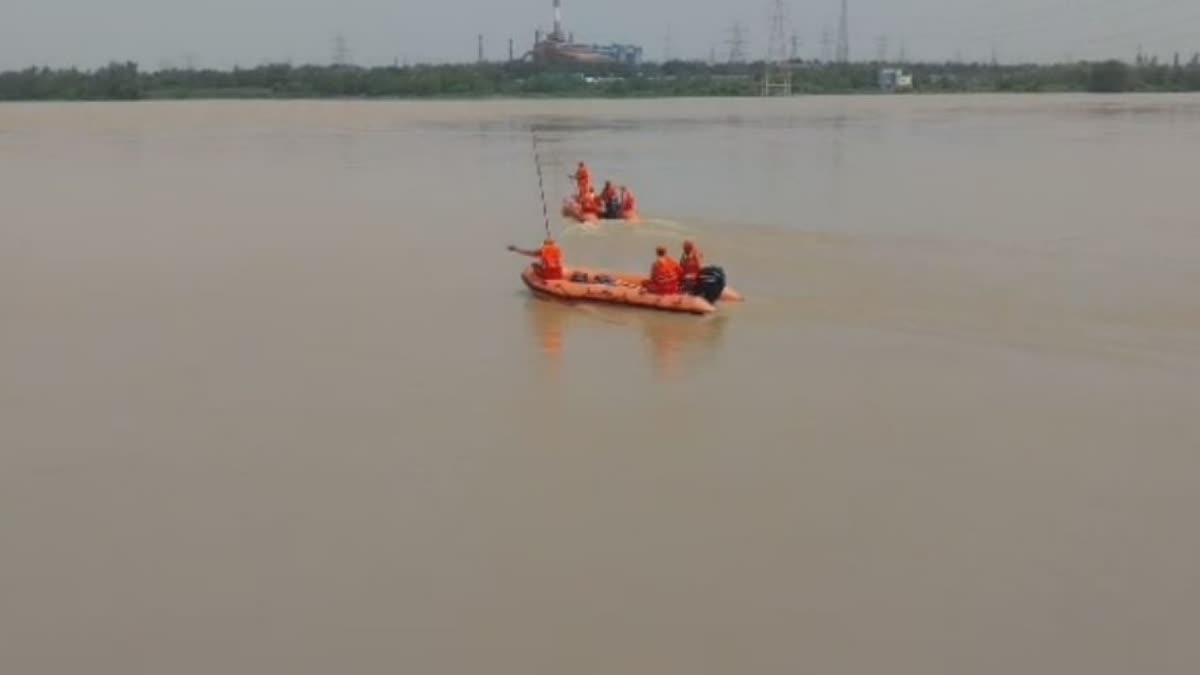 two student washed away in mahanadi