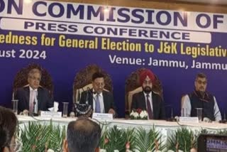 CEC Rajiv Kumar (M) flanked by election commissioners addresses a presser at Jammu on Friday Aug 9, 2024