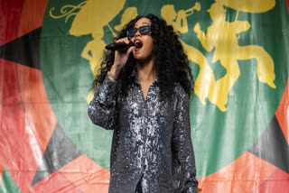 The five-time Grammy winner American singer Gabriella Sarmiento Wilson, renowned as H.E.R, will perform at the closing ceremony of the prestigious Paris Olympics and is expected to sing the US national anthem live at the  Stade de France as part of the handover for the Los Angeles Summer Games in 2028.