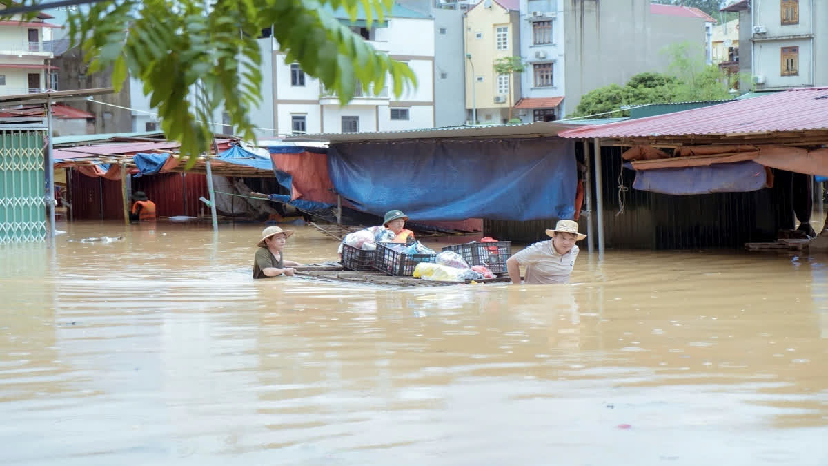 Flooding Sweeps Away Bus And Bridge Collapses In Vietnam As Storm Deaths Rise To 59