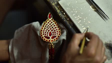 Jewellers are manufacturing Assamese traditional jewelry at Doogdoogi Jewellery workshop ahead of Rongali Bihu in Ranthali village, Nagaon district, Assam, India, on April 8, 2024.