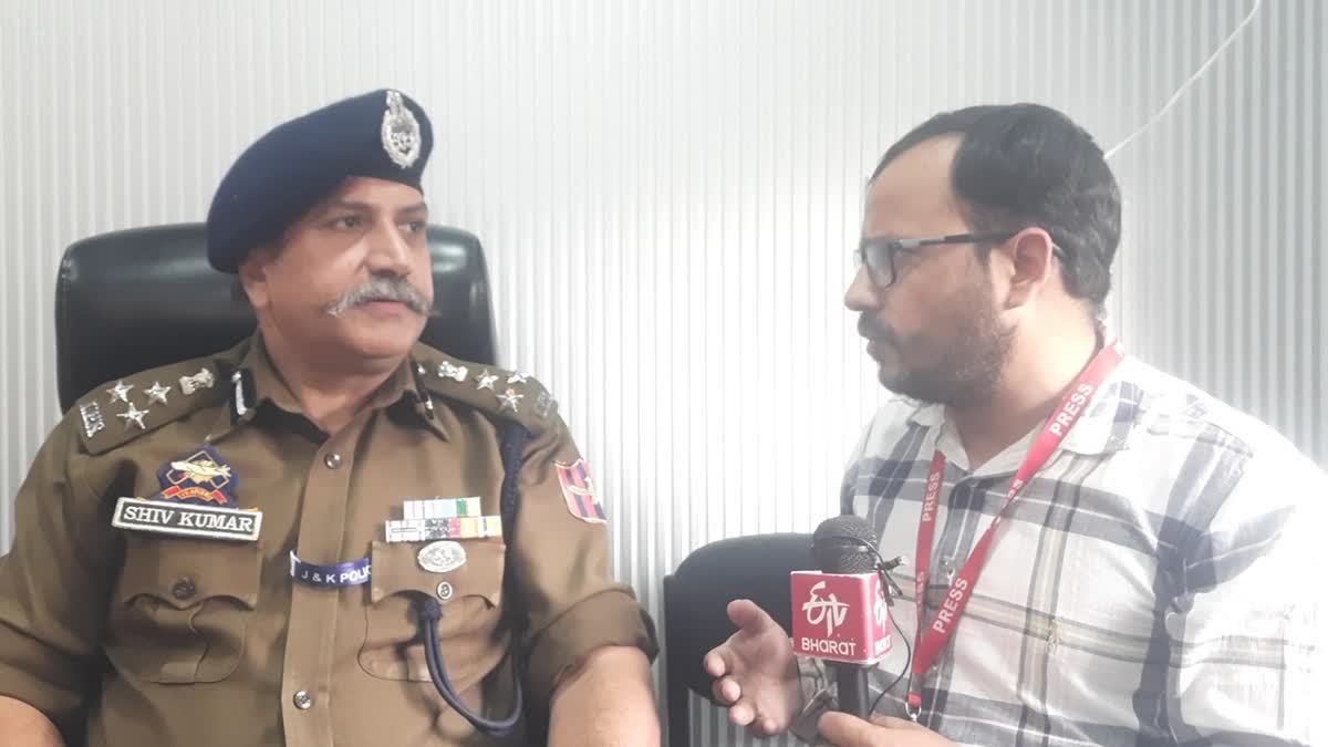 DIG Jammu Kathua Samba Range, Shiv Kumar Sharma (L) in conversation with ETV Bharat reporter Mohd Ashraf Ganie over sudden spurt in militancy related incidents in Jammu and Kashmir