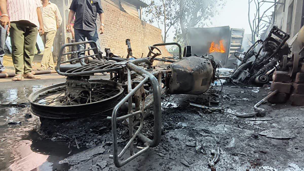 The charred remains of a motorbike at the godown