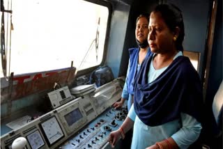 File - Woman Loco Pilots driving the passenger train, travelling from Ranchi to Lohardaga, on the occasion of International Women's Day, at Ranchi Railway Station