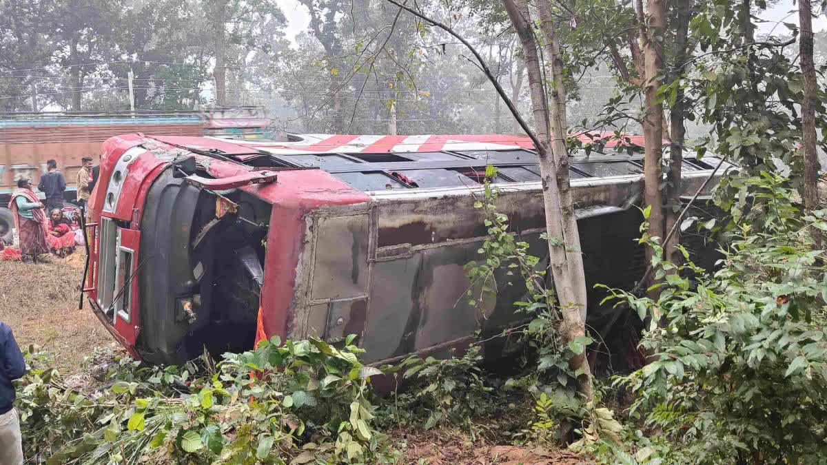 Bus overturns