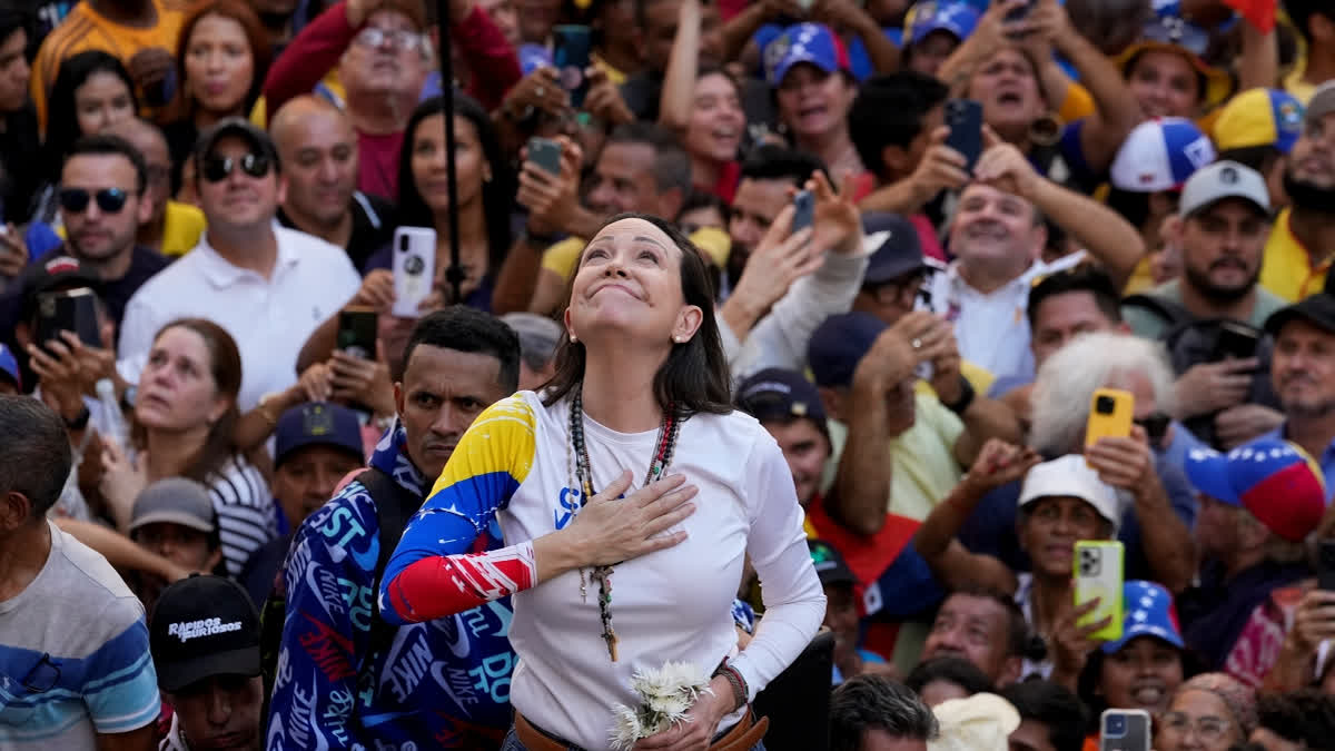 Venezuelan opposition leader Maria Corina Machado addresses supporters at a protest against President Nicolas Maduro in Caracas, Venezuela, Thursday, Jan. 9, 2025, the day before his inauguration for a third term.