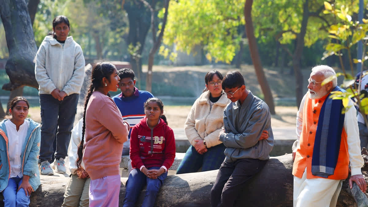 In this image released by PMO (DPR) on Monday, Feb. 10, 2025, Prime Minister Narendra Modi interacts with students on different aspects of stress-free exams under Pariksha Pe Charcha programme, in New Delhi.