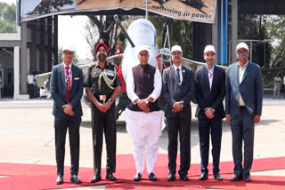 In this photo provided by the PIB, Defence Minister Rajnath Singh visits the LCAMK1A production facility of Hindustan Aeronautics Limited, in Bengaluru, Karnataka, Saturday, Feb.9, 2025.