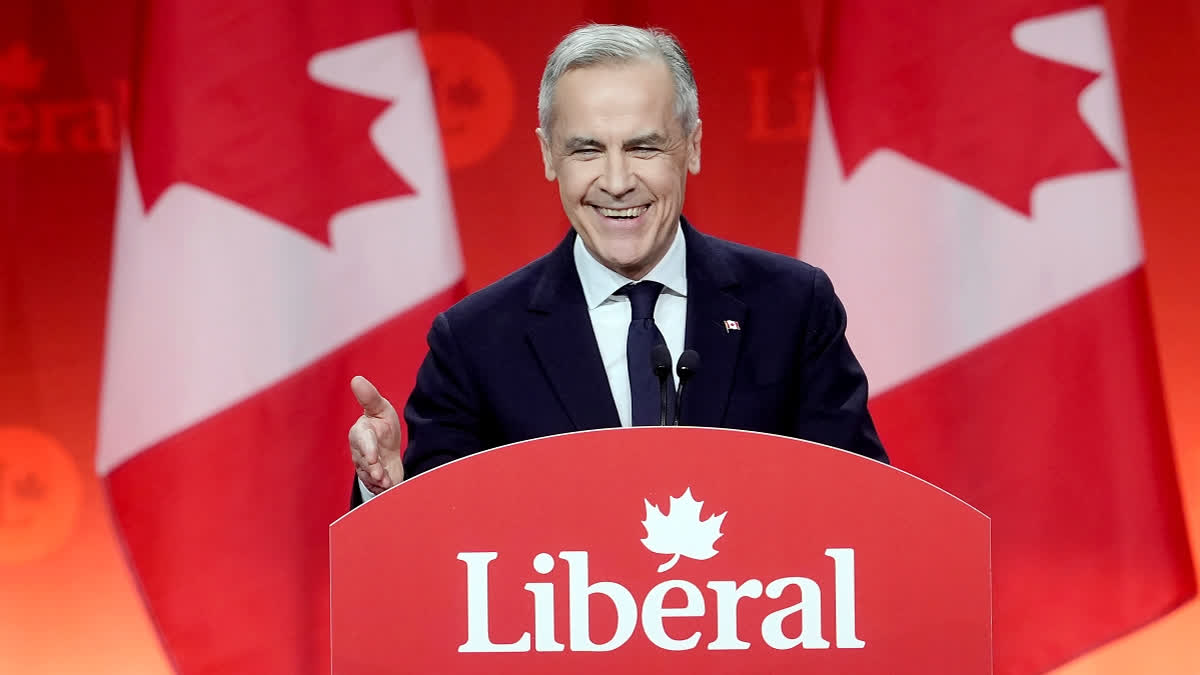 Liberal Leader Mark Carney smiles as he delivers his victory speech during the Liberal leadership announcement in Ottawa, Ontario, Sunday, March 9, 2025.