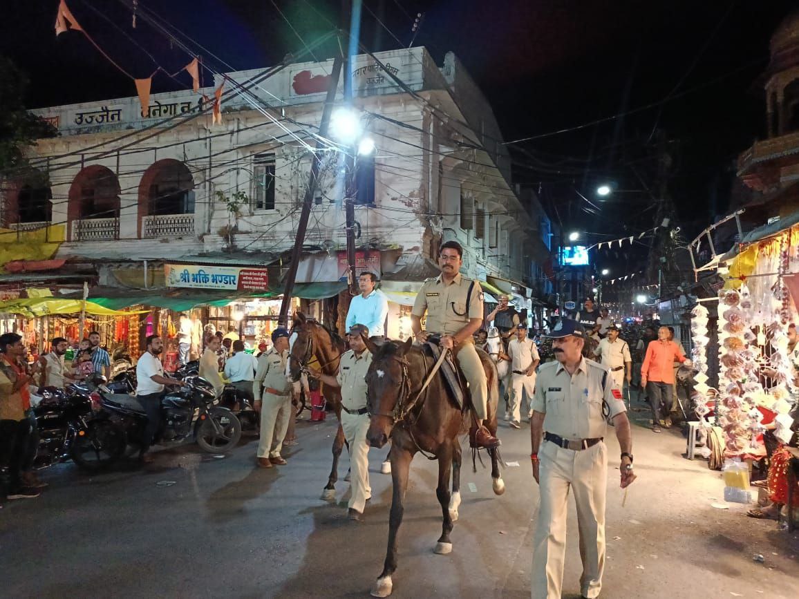 UJJAIN SP COLLECTOR ON HORSE FLAG MARCH LOKSABA ELECTION