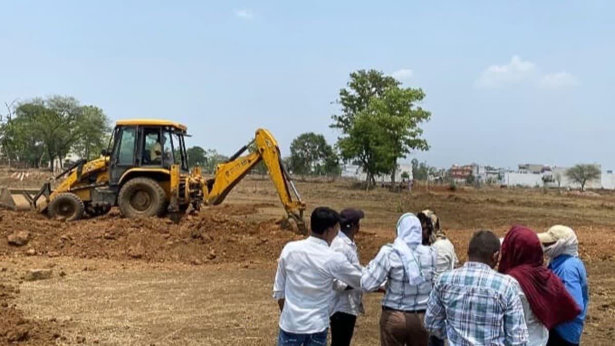 BULLDOZER ACTION ON ILLEGAL PLOTTING