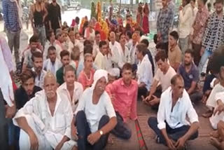 Villagers sitting on strike