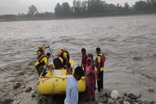 A team of the State Disaster Response Force (SDRF) rescued 12 villagers who were trapped in the sand dune in the Yamuna River in Uttarakhand's Vikasnagar, official sources said. The incident took place in the Pachwadun region. According to sources, the victims work as labourers and shift sand and gravel from the river.